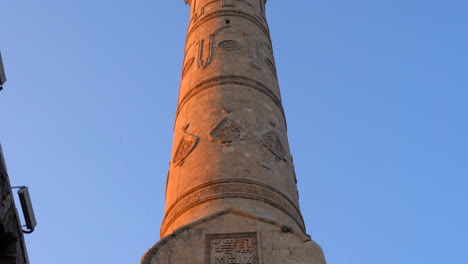 Mardin-Ulu-Camii's-minaret-bottom-up-during-sunset