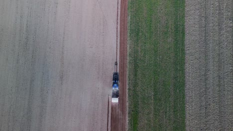 Majestic-aerial-view-flight-vertical-bird's-eye-view-drone
tractor-on-fall-field-brandenburg-havelland-Germany-at-summer-2022