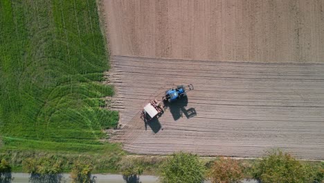 Farmer-checks-agricultural-equipment