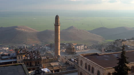 Camera-is-zooming-out-from-Ulu-Camii's-minaret-over-looking-Mezopotemia-on-a-beautiful-sunny-day