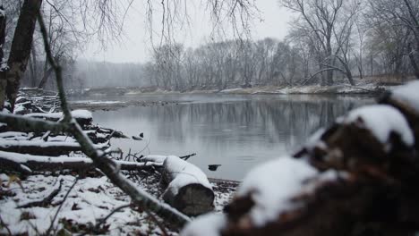 Snowfall-On-Michigan-River-During-Winter
