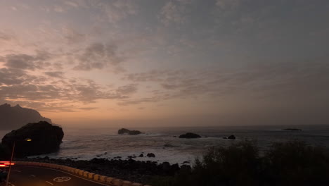 Sunset-Time-Lapse-of-the-Atlantic-Ocean-in-Tenerife-with-Dramatic-Waves-on-a-Rocky-Beach