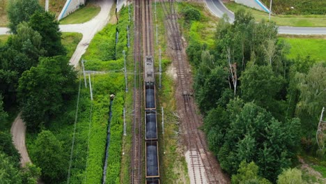 Railway-cargo-train-wagon-rides-on-railroad