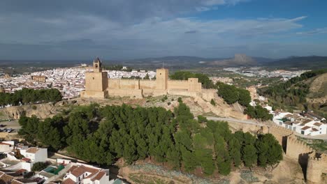 Antequera-Fortress-and-cityscape-in-Andalusia,-Spain---Aerial-4k