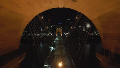 Aerial-Night-Flythrough-Suspension-Bridge-Tower,-Cincinnati,-Ohio