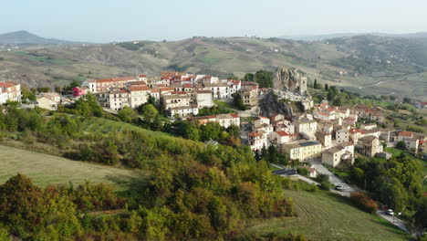Aerial-orbiting-shot-of-a-hilltop-old-town-Pietracupa-in-Molise-region-in-Italy