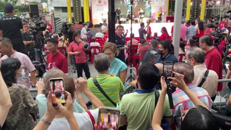 People-welcome-the-arrival-of-Singapore-Second-Minister-Josephine-Teo-at-the-much-anticipated-Chinese-New-Year-Street-light-up-event-in-Singapore's-Chinatown