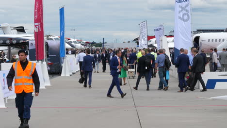 People-Visiting-Business-Jets-at-Display-at-EBACE-2022,-Geneva-Airport