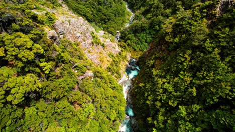 New-Zealand-Drone-Aerial-of-Devil’s-Punchbowl-Waterfall,-View-of-Stream-at-Top