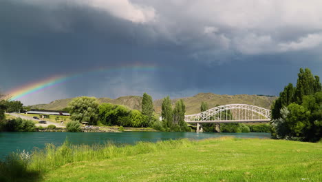 Arched-white-color-bridge-in-Alexandra-town,-New-Zealand,-just-before-rainfall
