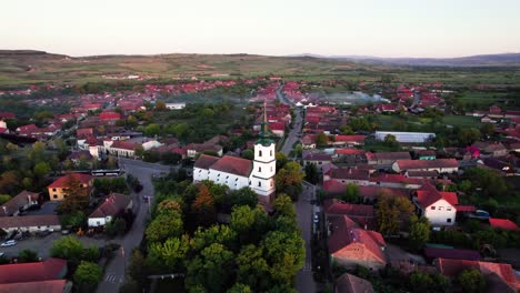 Aerial-panorama-of-reformed-protestant-church-in-center-of-green-village