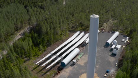 Aerial-view-of-the-construction-yard-of-a-wind-turbine-where-you-can-see-the-different-parts-that-form-it