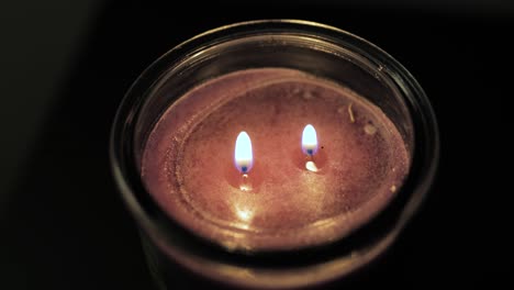 Candle-with-two-fires-two-wicks-seen-from-top-down