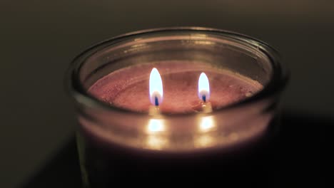 Failing-to-blow-out-candle-with-two-wicks-two-fires