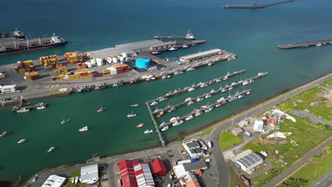 Industrial-harbor-in-Bluff-region,-New-Zealand,-aerial-drone-orbit-view