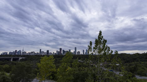 Timelapse-of-stormy,-overcast-sky-over-the-downtown-Toronto-skyline-from-Chester-Hill-Lookout
