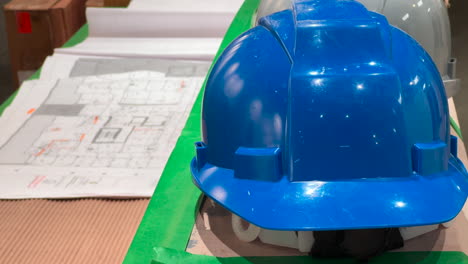 Construction-industry-hard-hat-and-building-plans