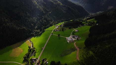 A-Slow-Revealing-Drone-Shot-of-the-Town-Johnsbach-in-Gesause-National-Park,-Austria