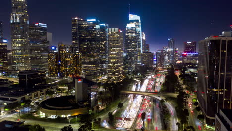 Drone-hyperlapse-of-downtown-Los-Angeles-and-traffic-on-110-Freeway