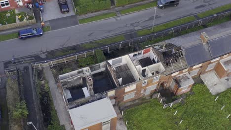 Drone-shot-showing-fire-damage-houses-in-Whitebirk,-Blackburn-Lancashire