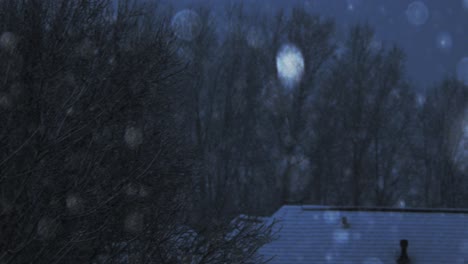 snowfall-over-rooftops-and-trees,-panning-from-right-to-left-in-slow-motion-in-the-evening