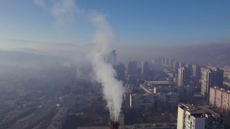 Going-through-heavy-smoke-coming-out-of-chimney-in-polluted-city