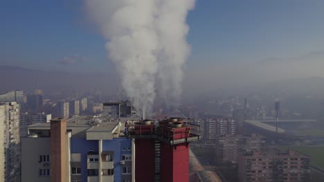Aerial-View-of-chimney-with-heavy-smoke-in-Polluted-City