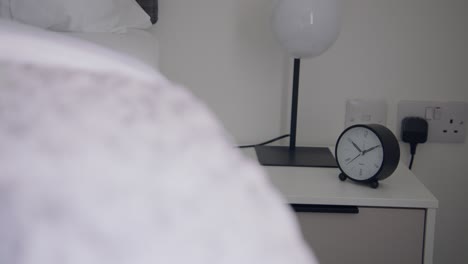 Modern-clock-on-the-bedside-table