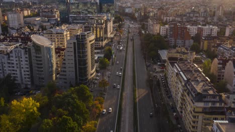 drone-timelapse-of-the-city-of-Sofia,-Bulgaria-along-a-busy-boulevard