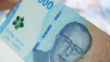 Close-up-of-the-newest-2022-edition-50000-or-fifty-thousand-rupiah-bank-note