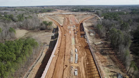 Wide-drone-shot-of-large-highway-construction,-540-Beltline-North-Carolina