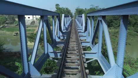 Railway-bridge,-symmetrical-structure-drone-fast-fly-through