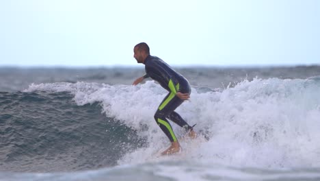 Surfer-rides-a-wave-in-slow-motion-at-Gran-Canaria-beach