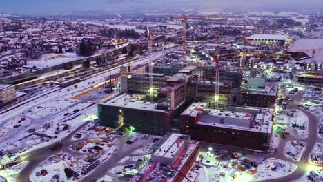 Construction-site-close-to-railway-and-highway-early-in-the-morning-in-Drammen,Norway
