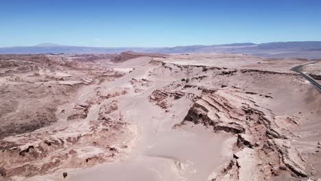 Aerial-Flight-Above-Dunes-in-Moon-Valley,-Landscape-of-Atacama-Desert