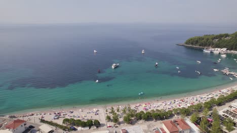 Crystal-clear-turquoise-waters-and-multi-colored-sandy-beaches-of-Himare,-Albania