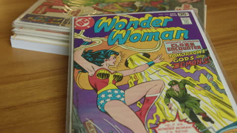 Close-Up-Tilt-Down-of-a-Wonder-Woman-Comic-Book