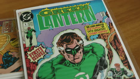 Close-Up-Tilt-Up-of-a-Green-Lantern-Comic-Book