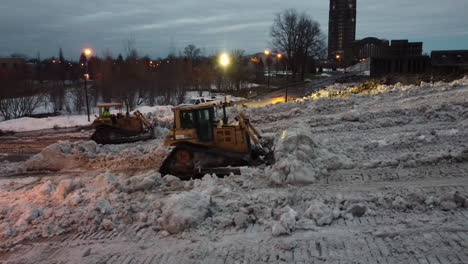 Snowplow-Vehicle-Removing-Snow,-Working-in-Buffalo,-New-York-City-after-Deadly-Storm,-Snowiest-Season