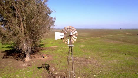 wind-vane-aerial-orbit-on-old-farm-site-in-central-california