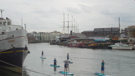 Stand-up-Paddle-Boarding-In-Bristol-Wharf,-England,-United-Kingdom
