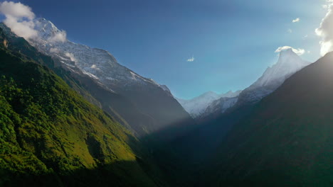 Aerial-drone-view-flying-through-the-magnificent-Annapurna-Mountain-Range-in-the-Himalayas,-Nepal