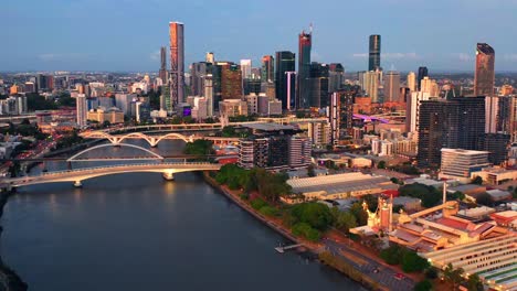 Aerial-view-of-Brisbane-City-South-Bank-and-CBD-from-Toowong-suburb-during-Golden-Hour-sunset