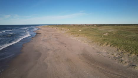 Smooth-Waves-On-Magical-Sandy-Beach-near-Klitmoller,-Marvelous-Blue-Water,-Denmark,-Europe