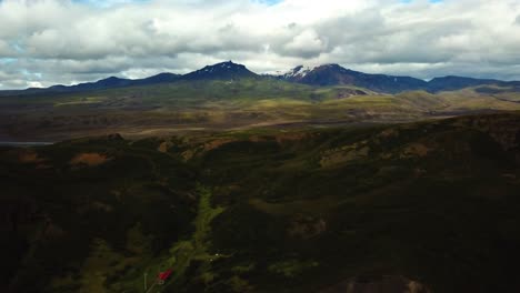Aerial-panoramic-view-of-mountain-and-valleys-landscape,-in-the-FimmvÃ¶rÃ°uhÃ¡ls-area,-Iceland