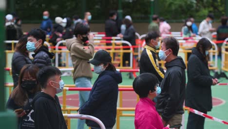 Chinese-residents-go-through-a-Covid-19-Coronavirus-screening-testing-as-a-public-housing-complex-is-placed-under-lockdown-after-a-large-number-of-residents-tested-positive