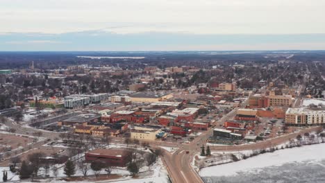 Aerial,-downtown-Stevens-Point,-Wisconsin-during-winter-season