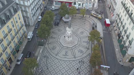 aerial-backwards-view-of-Camões-square-in-Chiado-Lisbon-Portugal