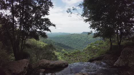 View-Over-Green-Hills-From-Top-of-Waterfall