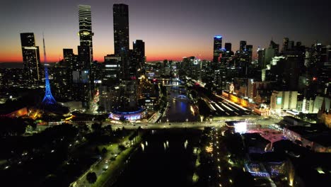 Melbourne-Lights-Yarra-River-Sonnenuntergang-Stadtansichten-Vorwärts-Antenne